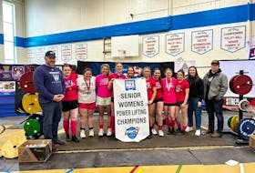 The Westisle Wolverines won the P.E.I. School Athletic Association (PEISAA) senior girls’ powerlifting championship in Charlottetown recently. Team members are, from left, George Kinch (head coach), Hallie Harper, Rachael Arsenault (top overall lifter at the provincial championships), Reid Hart, Ava Rennie, Anna Arsenault, Annie Buote, Hilary Cahill, Alana Burden, Maria Dean, Hailey Williams and Jaxon Maynard. Williams and Maynard are former Westisle lifters who assisted the Wolverines at the provincial championship. Contributed