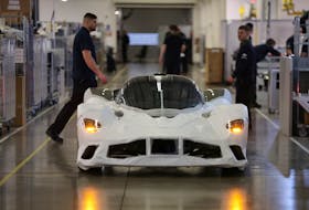 An Aston Martin Valkyrie car is driven off the production line at the company’s factory in Gaydon, Britain, March 16, 2022. Picture taken March 16, 2022.