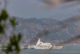 A Chinese coastguard ship sails during a military drill near Fuzhou, Fujian Province, near the Taiwan-controlled Matsu Islands that are close to the Chinese coast, China, April 8, 2023. 