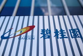 The company logo of Chinese developer Country Garden is pictured at the Shanghai Country Garden Center in Shanghai, China August 9, 2023.