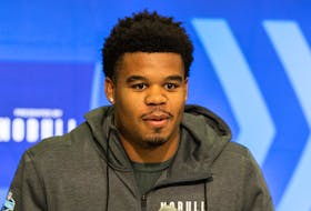 Feb 28, 2024; Indianapolis, IN, USA; Penn State defensive lineman Chop Robinson (DL45) talks to the media at the 2024 NFL Combine at Indiana Convention Center. Mandatory Credit: Trevor Ruszkowski-USA TODAY Sports