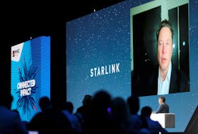 SpaceX founder and Tesla CEO Elon Musk speaks on a screen during the Mobile World Congress (MWC) in Barcelona, Spain, June 29, 2021.