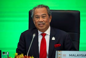 Malaysia's Prime Minister Muhyiddin Yassin speaks during opening remarks for virtual APEC Economic Leaders Meeting 2020, in Kuala Lumpur, Malaysia November 20, 2020.