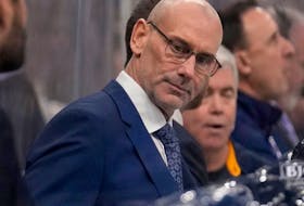 St. Louis Blues interim head coach Drew Bannister is seen on the bench during the first period of an NHL hockey game between the St. Louis Blues and the Ottawa Senators Thursday, Dec. 14, 2023, in St. Louis.