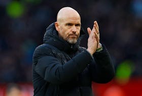 FILE PHOTO:Soccer Football - Premier League - Manchester United v Fulham - Old Trafford, Manchester, Britain - February 24, 2024 Manchester United manager Erik ten Hag applauds fans after the match Action Images via Reuters/Jason Cairnduff/File Photo