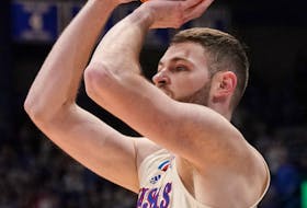 Feb 27, 2024; Lawrence, Kansas, USA; Kansas Jayhawks center Hunter Dickinson (1) shoots a three point shot against the Brigham Young Cougars during the second half at Allen Fieldhouse. Mandatory Credit: Denny Medley-USA TODAY Sports/ File photo