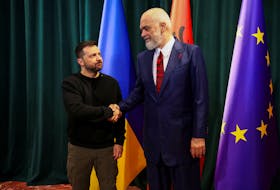 Albanian Prime Minister Edi Rama shakes hands with Ukrainian President Volodymyr Zelenskiy on the day of the Ukraine Southeast Europe Summit in Tirana, Albania, February 28, 2024.