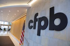 Signage is seen at the Consumer Financial Protection Bureau (CFPB) headquarters in Washington, D.C., U.S., May 14, 2021.