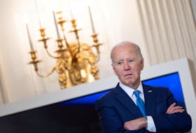 U.S. President Joe Biden looks on before speaking during a roundtable discussion on public safety at the State Dining Room at the White House in Washington, U.S., February 28, 2024.