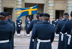 Swedish soldiers take part in the changing of the guard ceremony in the courtyard of the Royal Palace in Stockholm, Sweden, Feb. 24, 2024. The country's NATO accession ends the era of go-it-alone security.REUTERS/Tom Little/File Photo