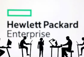 Figurines with computers and smartphones are seen in front of Hewlett Packard Enterprise logo in this illustration taken, February 19, 2024.