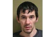 The Amherst Police Department is looking for 37-year-old Jamie Trenholm in connection with a robbery and assault on Sunday, Feb. 25.