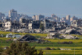 A view of damaged buildings in the Gaza Strip, amid the ongoing conflict between Israel and Palestinian Islamist group Hamas, as seen from southern Israel, February 29, 2024.