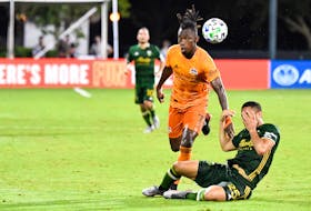 Jul 18, 2020; Kissimmee, FL, USA; Houston Dynamo forward Alberth Elis (7) fouls Portland Timbers defender Bill Tuiloma (25) and receives a red card during the second half at ESPN Wide World of Sports. Mandatory Credit: Douglas DeFelice-USA TODAY Sports/ File Photo