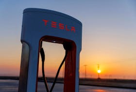 A Tesla supercharging station is seen in the early morning sun, in Kettleman City, California, U.S., January 25, 2023. 