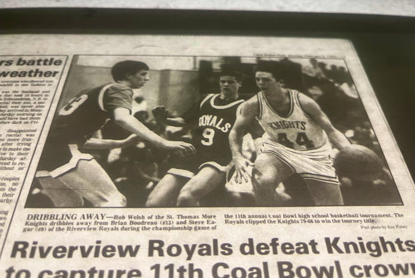 A photo from the Feb. 3, 1992 edition of the Cape Breton Post, from when the Riverview High Royals basketball team won the first Coal Bowl for a Cape Breton team in the tournament's history. But those in attendance have said the fallout from a "raging blizzard" outside, which kept many storm stayed overnight at Breton Education Centre, is the memory that stood the test of time. CAPE BRETON POST ARCHIVE