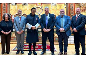 UNB professors Carol Nemeroff, left, and John Kershaw, King Jigme Khesar Namgyel Wangchuck, UNB president Paul Mazerolle, UNB professor Michel Rod and Dominic Blakely, UNB innovation and entrepreneurship strategist, announced the five-year renewal of exchange and collaboration agreement between the UNB and the Royal University of Bhutan.