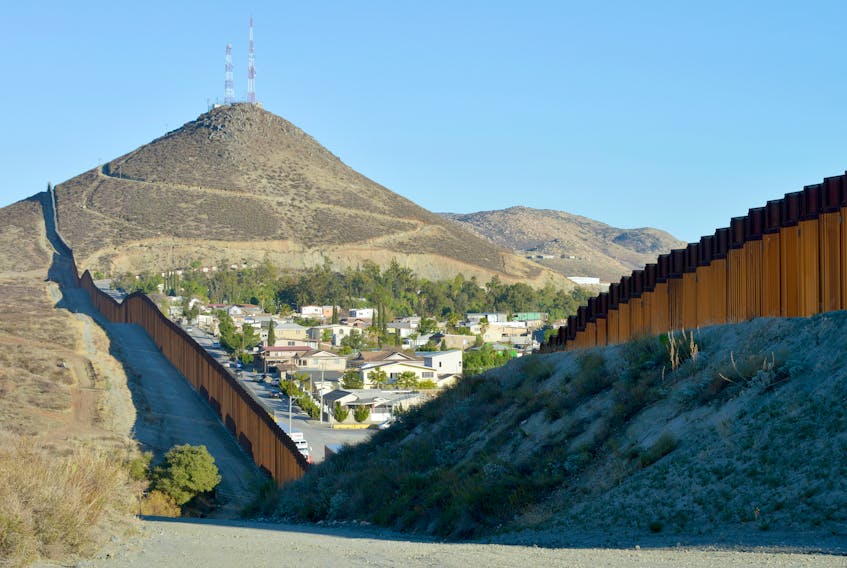 Tecate, Mexico can be from the American side of the wall at the U.S.-Mexico border. Greg Bulla • Unsplash