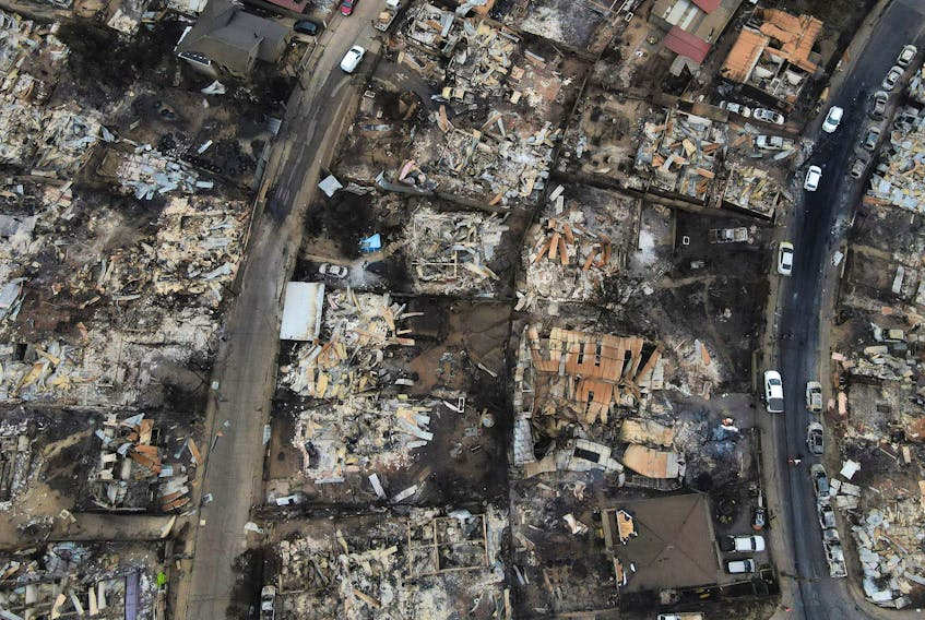An areal view shows the burnt remains of houses following the spread of wildfires, in Vina del Mar, Chile February 4, 2024.