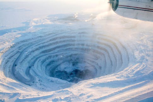 An aerial view of an open pit mine is seen at the Diavik diamond mine, south of the Arctic Circle in Canada's Northwest Territories, February 13, 2008.