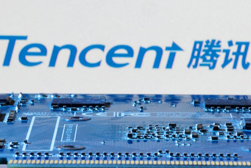 Tencent logo is seen near computer motherboard in this illustration taken January 8, 2024.