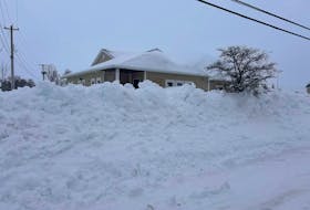 Madelaine O'Reilly submitted this photo of the Membertou Health Centre, Monday morning. In the caption she wrote "This morning, I drove around Membertou and cried. This storm is Crazy!    Everyone is snowed in.   Most driveways have 10ft.    Public works, plows and shovellers are working non stop. Please be patient!   Its going to be awhile before everyone is done." CONTRIBUTED/MADELAINE O'REILLY