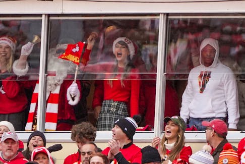 Dec 25, 2023; Kansas City, Missouri, USA; Entertainer Taylor Swift cheers during the first half of the game between the Kansas City Chiefs and Las Vegas Raiders at GEHA Field at Arrowhead Stadium. Mandatory Credit: Denny Medley-USA TODAY Sports/File Photo