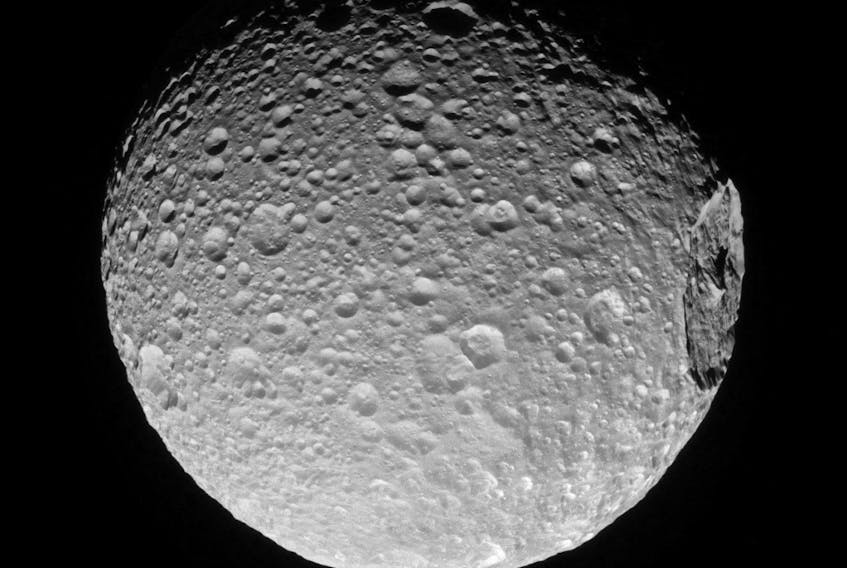 Saturn's moon Mimas is seen in this image from NASA's Cassini spacecraft released on March 13, 2017. NASA/JPL-Caltech/Space Science Institute/Handout via