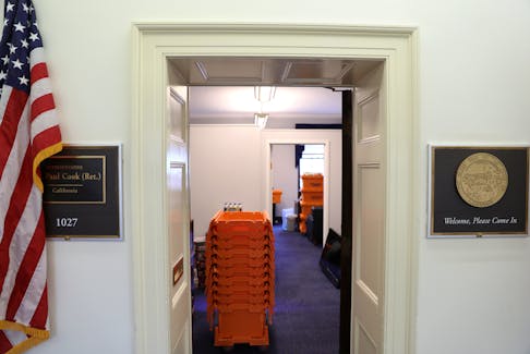 Stacks of moving crates sit in a U.S. Congressional office weeks before the end of the current term, as dozens of outgoing and incoming members of Congress move into and out of Washington as votes on a potential federal government shutdown loom, on Capitol Hill in Washington, U.S., December 17, 2018.