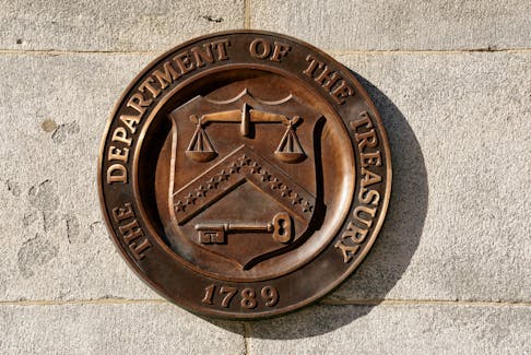 A bronze seal for the Department of the Treasury is shown at the U.S. Treasury building in Washington, U.S., January 20, 2023.REUTERS/Kevin Lamarque/File Photo