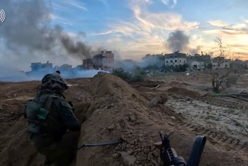 Israeli soldiers operate in a location given as Khan Younis, Gaza, amid the ongoing conflict between Israel and the Palestinian Islamist group Hamas, in this screen grab taken from a handout video released on February 1, 2024. Israel Defense Forces/Handout via REUTERS