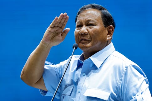 Indonesia's Defence Minister and presidential candidate Prabowo Subianto salutes to his supporters after delivering a speech at Jakarta Convention Center, during his campaign rally in Jakarta, Indonesia, February 2, 2024.