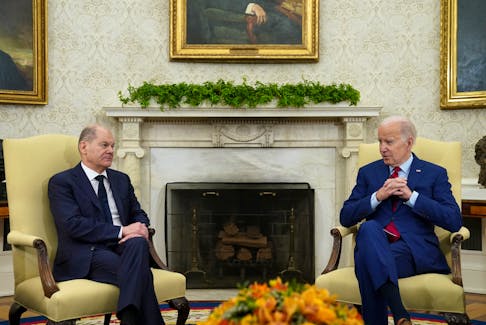 U.S. President Joe Biden meets with German Chancellor Olaf Scholz in the Oval Office of the White House in Washington, U.S., March 3, 2023. 