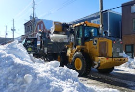 A Cape Breton Regional Municipality loader and dump truck were busy removing snow along Charlotte Street in downtown Sydney on Friday. The snow removal push saw the closure of Dorchester and Charlotte streets from Nepean to Pitt streets. Snow removal crews say the snow is being relocated to a dump site off of Inglis Street. Mitchell Ferguson/Cape Breton Post