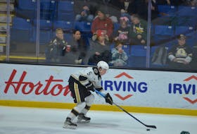 Charlottetown Islanders defenceman Max Jardine, 5, carries the puck during a recent Quebec Maritimes Junior Hockey League game at Eastlink Centre. The Islanders are hosting a ‘90s Night for their game against the Saint John Sea Dogs on Feb. 9 at 7 p.m. Jason Simmonds • The Guardian
