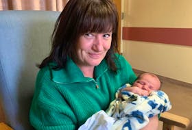 Tammy Stone seen here with her first grandson, Brandon: “It was a really interesting weekend, but it's pretty great. The baby's great, and everybody's just wonderful.”
