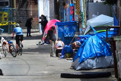 Back lane scenes as Downtown Eastside residents say they feel like the neighbourhood is more violent in the weeks since city officials removed tents from Hastings Street, in Vancouver, B.C. on June 15 2023.