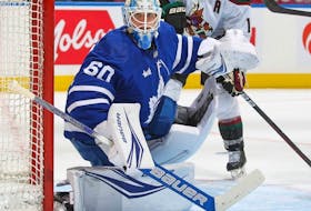 Toronto Maple Leafs goaltender Joseph Woll watches for a puck during his team's game against the Arizona Coyotes at Scotiabank Arena in Toronto on Feb. 29, 2024.
