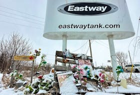 A file photo shows a memorial to the killed and injured workers on the day after the explosion at Eastway Tank in January 2022.