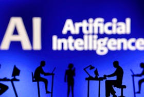 Figurines with computers and smartphones are seen in front of the words "Artificial Intelligence AI" in this illustration taken, February 19, 2024.