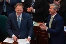 Finance Minister Allan MacMaster is applauded by Premier Tim Houston and his fellow Progressive Conservative MLAs as he rises to deliver the provincial budget at Province House on Thursday, Feb. 29, 2024.
Ryan Taplin - The Chronicle Herald