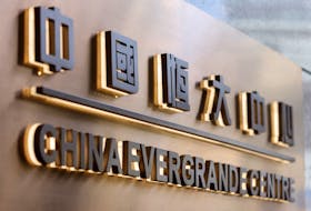 The China Evergrande Centre building sign is seen in Hong Kong, China December 7, 2021.
