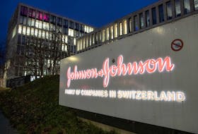 The logo of healthcare company Johnson & Johnson is seen in front of an office building in Zug, Switzerland December 1, 2021.