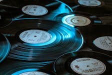 It does the heart some good to relax and listen to music from a vinyl record. UNSPLASH