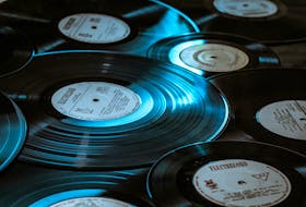It does the heart some good to relax and listen to music from a vinyl record. UNSPLASH