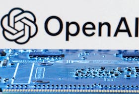 OpenAI logo is seen near computer motherboard in this illustration taken January 8, 2024.