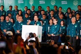 Taiwan President-elect Lai Ching-te speaks on stage at a rally, flanked by his running mate Hsiao Bi-khim, following the victory in the presidential elections, in Taipei, Taiwan, January 13, 2024.
