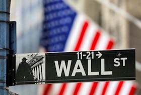 A street sign for Wall Street is seen outside the New York Stock Exchange (NYSE) in New York City, New York, U.S., July 19, 2021.