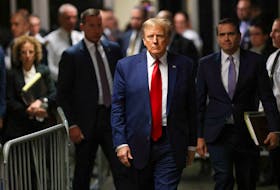 Former U.S. President Donald Trump walks outside the courtroom on the day of a court hearing on charges of falsifying business records to cover up a hush money payment to a porn star before the 2016 election, in New York State Supreme Court in the Manhattan borough of New York City, U.S., February 15, 2024.