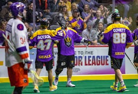 The San Diego Seals celebrate Austin Staats' (83) one of four goals he scored against the Halifax Thunderbirds on Saturday night in NLL action in San Diego. - JAKE WHITING / NATIONAL LACROSSE LEAGUE